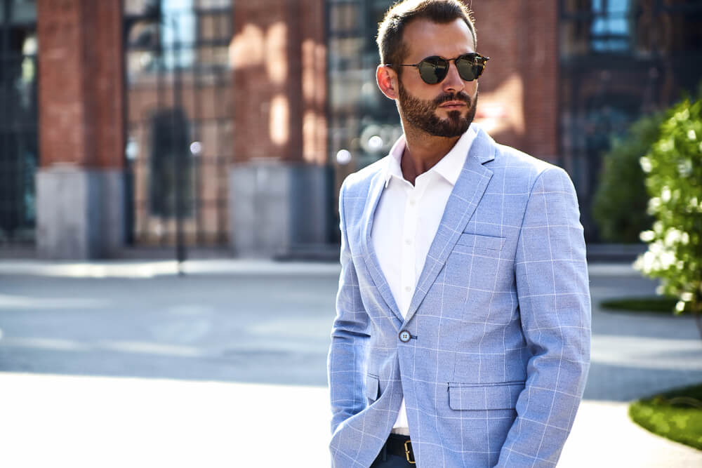 man in summer navy suit