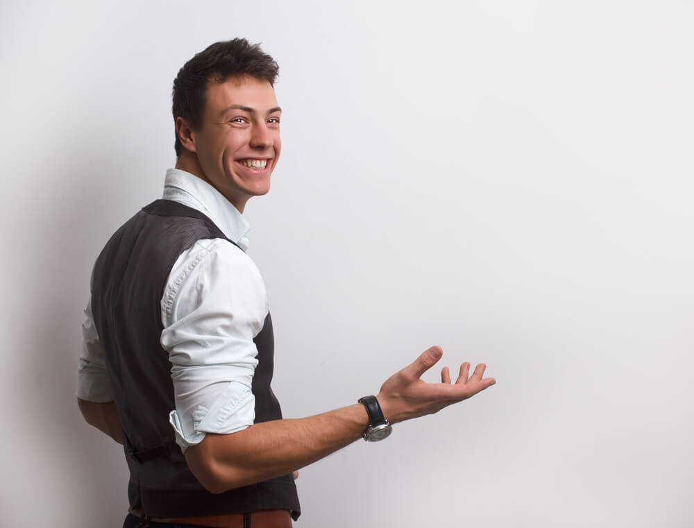 man wearing waistcoat with white shirt for wedding