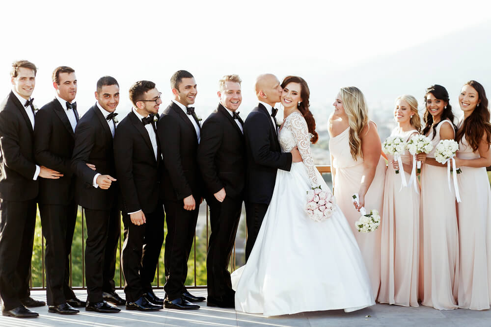 groomsmen in black tie wedding