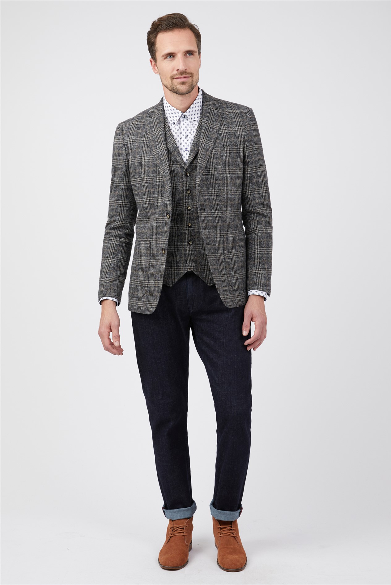 Man wearing a Jeff Banks grey and beige check blazer.