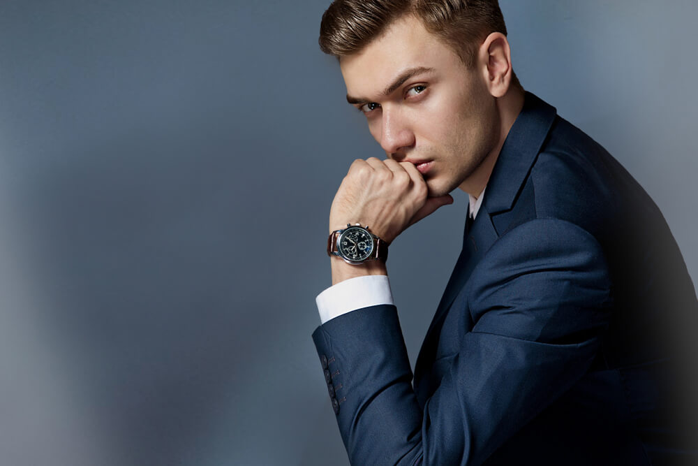 young man in navy suit