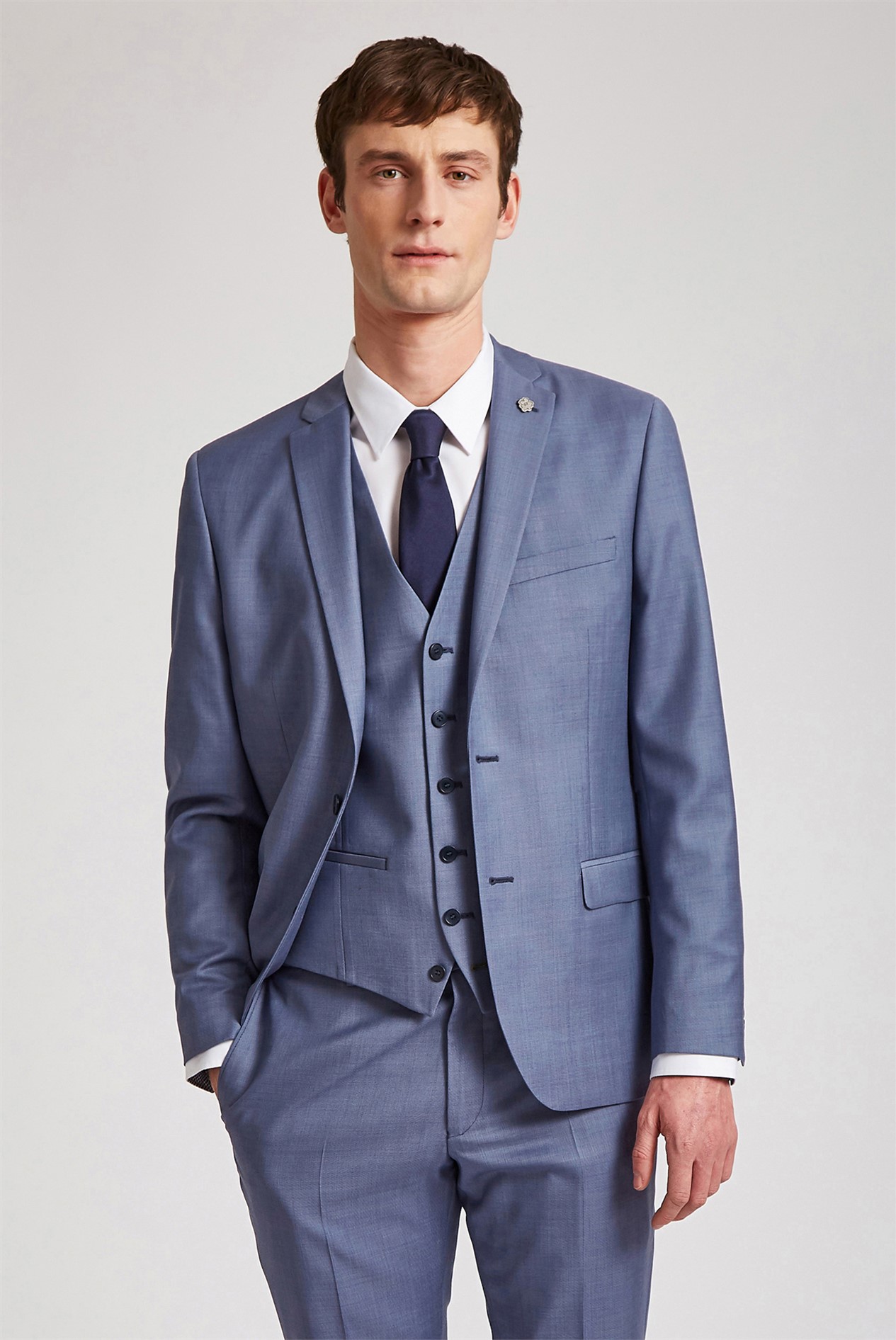 Man wearing a Ted Baker suit.