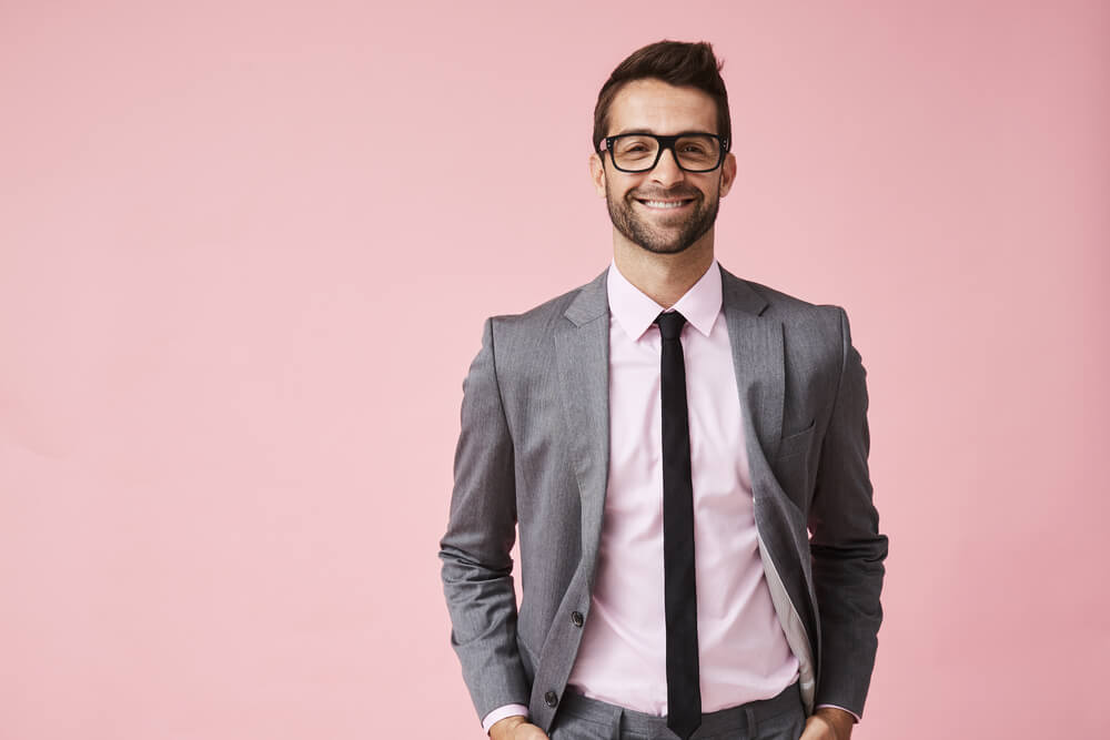 pink shirt with grey suit