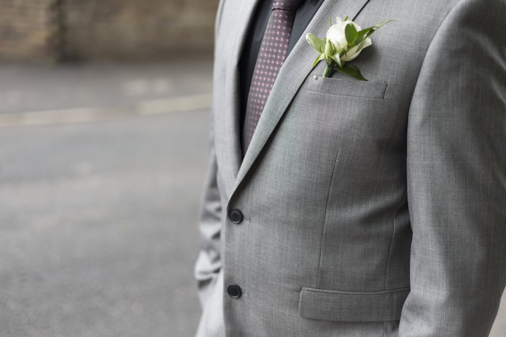 black shirt with grey suit