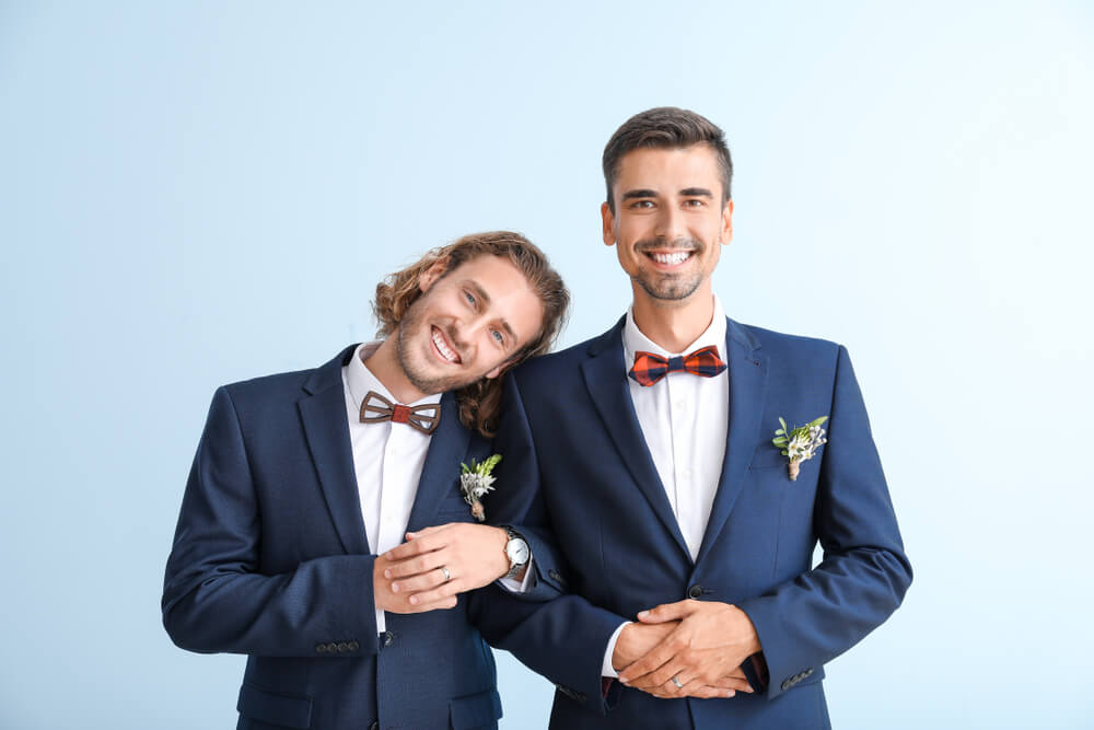 gay couple in suits