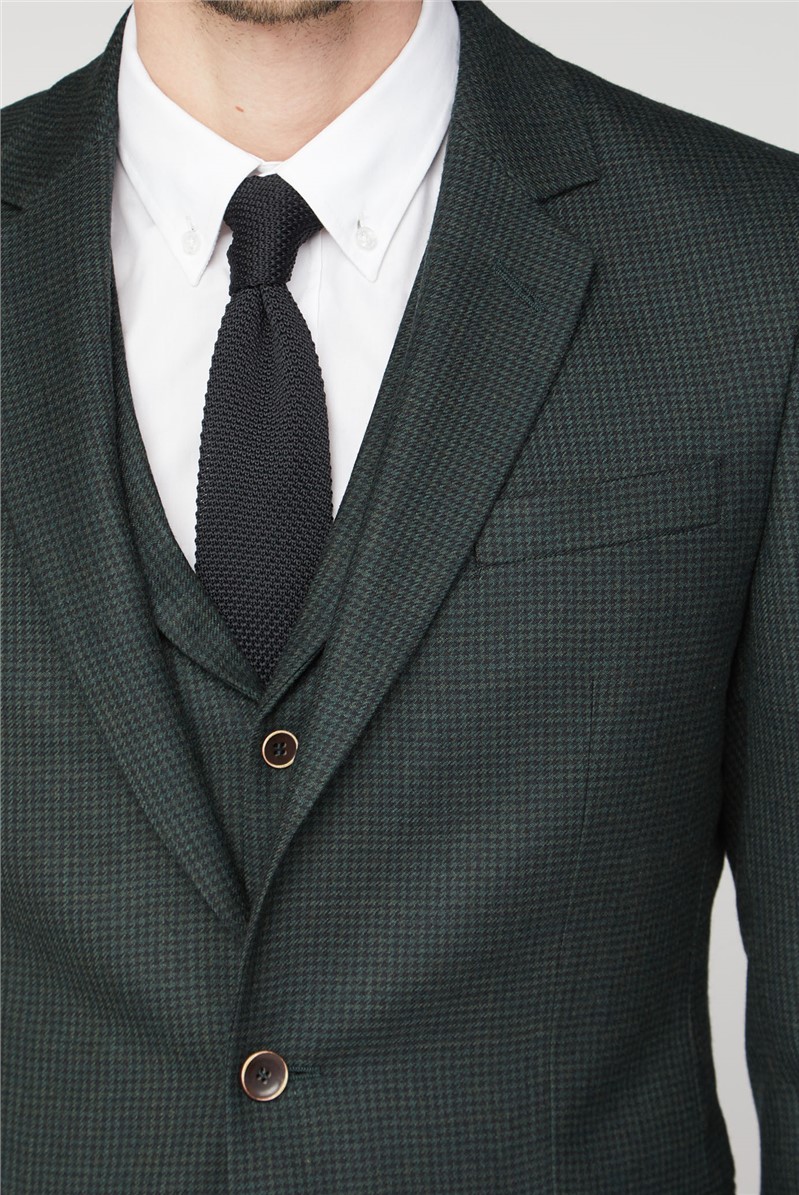 green patterned suit